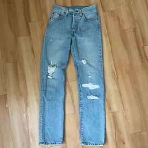 Levi's 501 slim straight leg distressed jeans